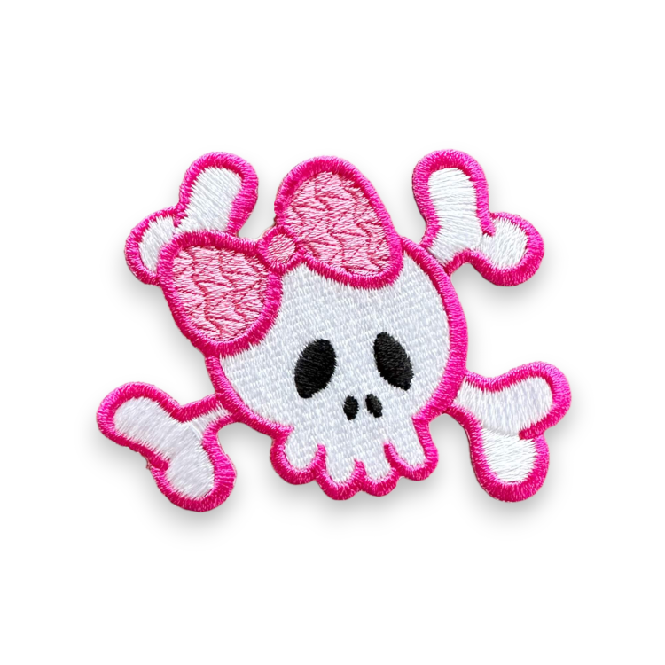 czaszka z koścmi różowa naszywka.png